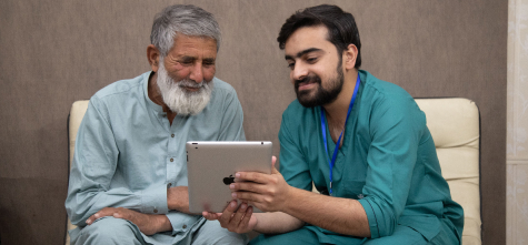 Caregiver assisting patient