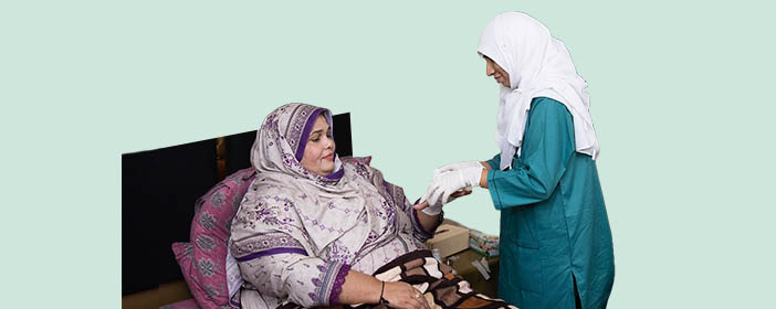 Nurse assisting the patient